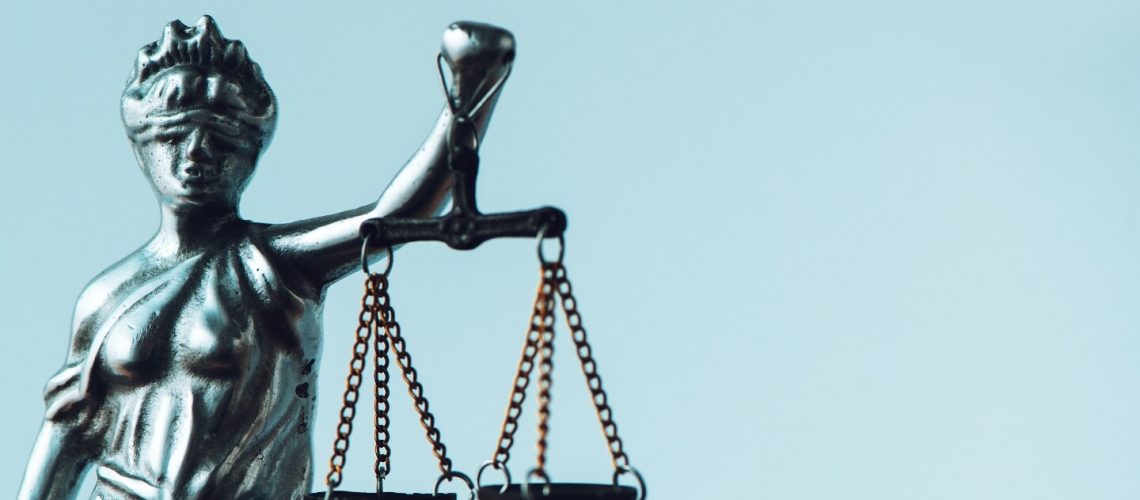 lady-justice-statue-in-law-firm-office-BJPQN2S.jpg
